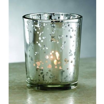 Box of 12 rustic silver glass votive holders with distressed vintage finish and warm reflective glow for candles